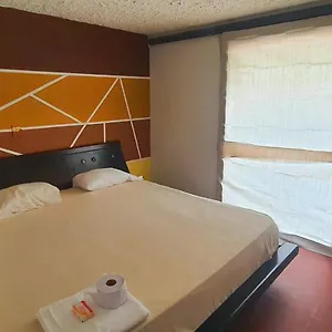 Chio's Habitación en casa particular